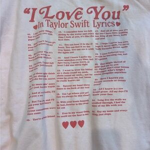 Light pink “I love you in Taylor Swift Lyrics” crewneck